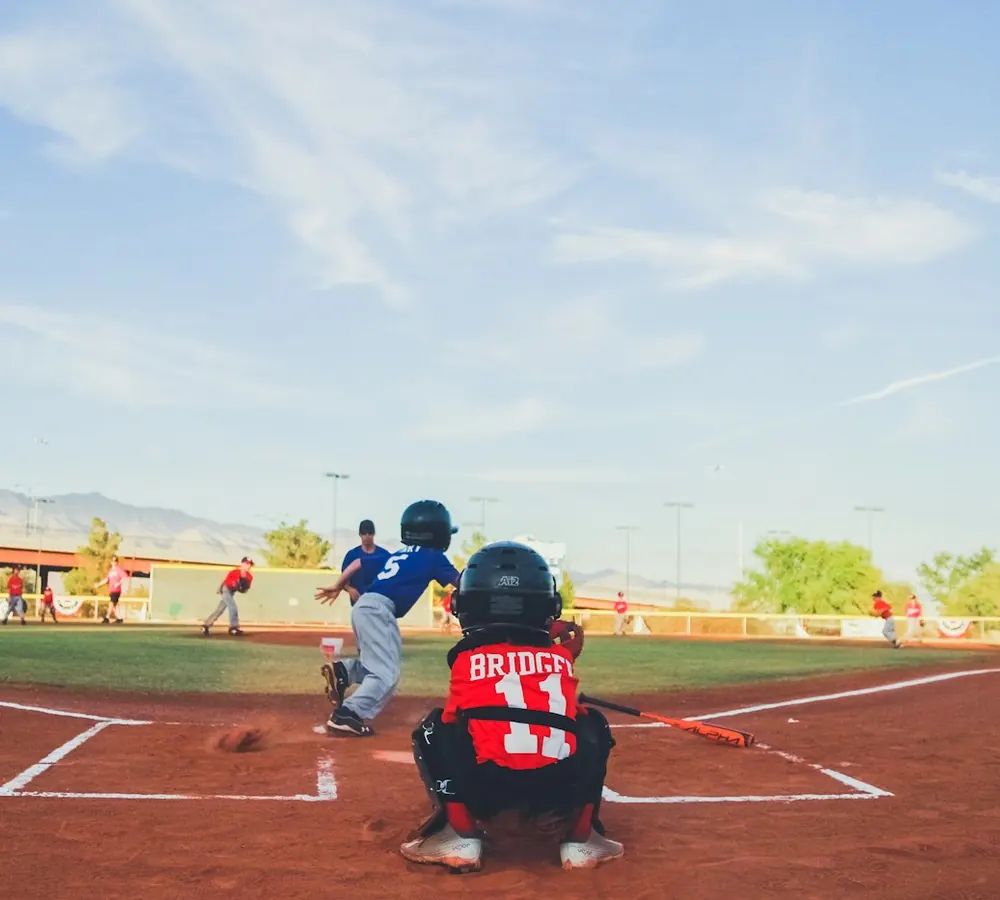 Youth baseball player at bat during a fall game